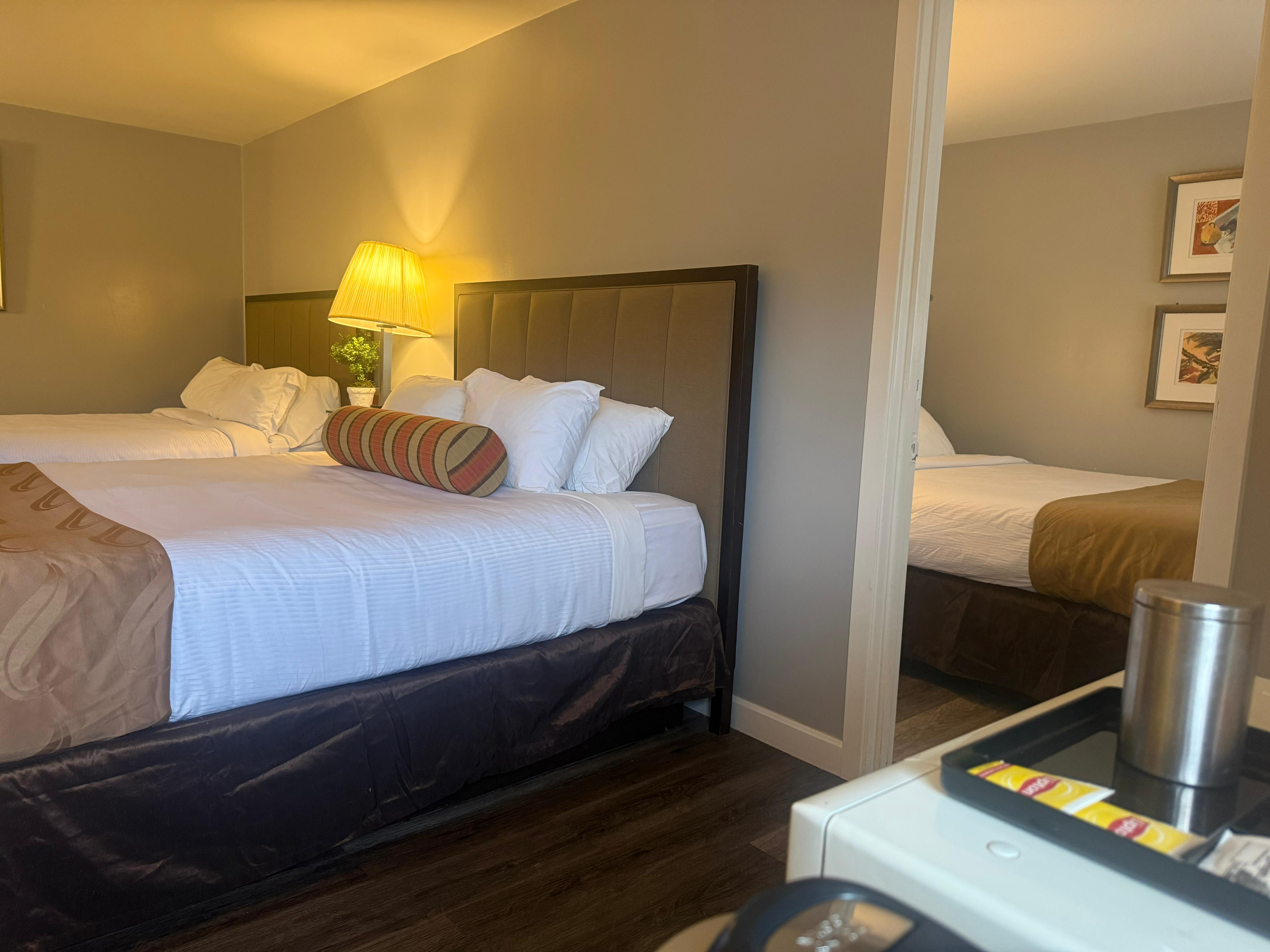 Three Queen Beds with One Private Room